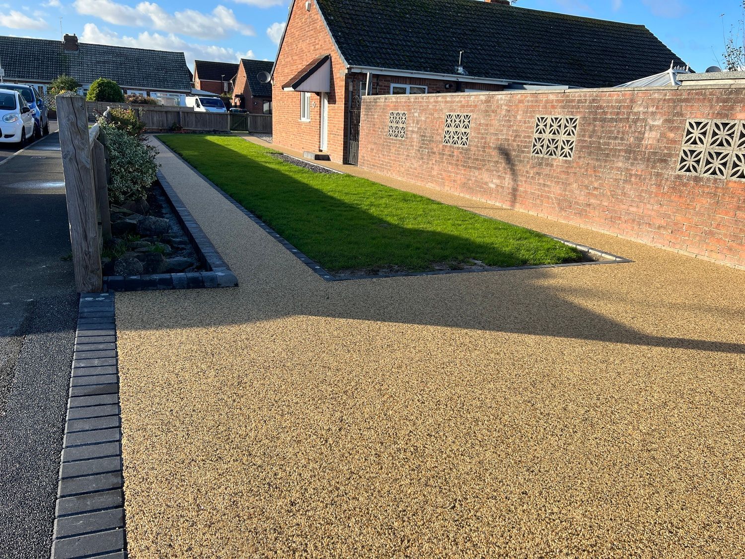 New resin driveway in a gold colour.