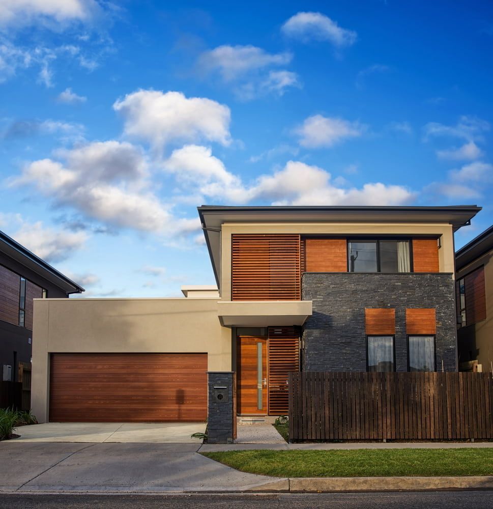 Modern Two-story House With Tan and Grey Exterior — Country Coast Valuers in Laurieton, NSW