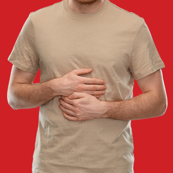 A man in a tan t-shirt is holding his hands to his chest