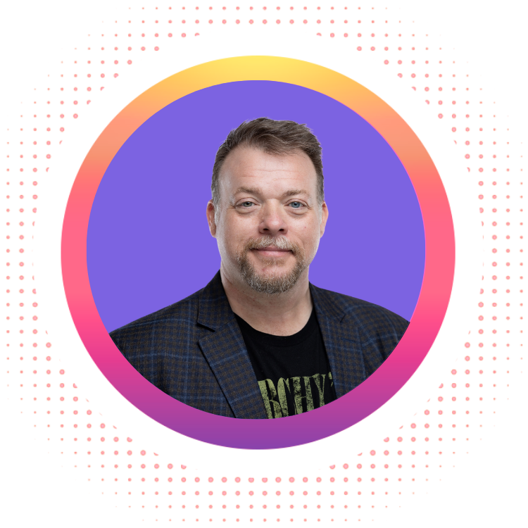 Man in a blazer and t-shirt, smiling, inside a purple and orange circle, with a dotted background.