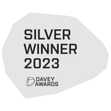 Silver Winner 2023 award badge from Davey Awards, with white text on a light gray irregular shape.