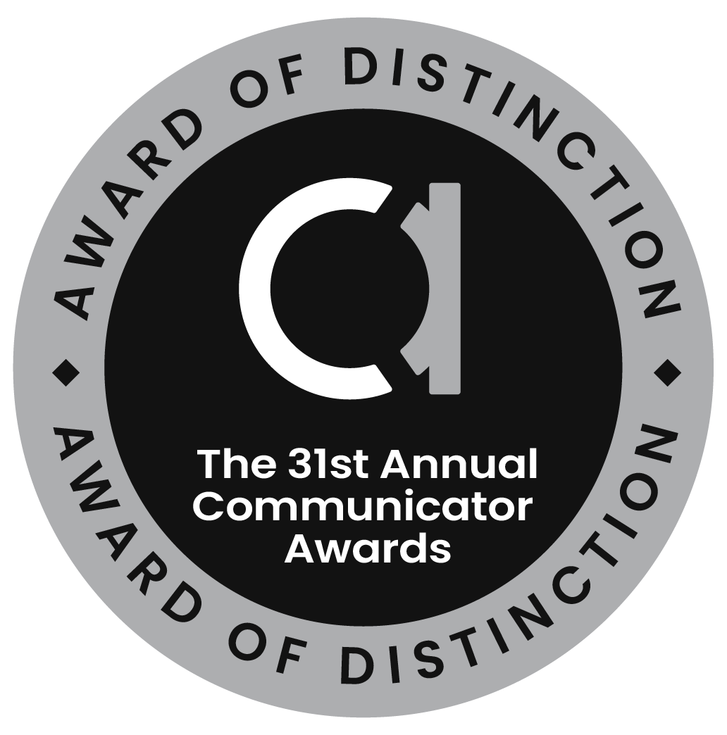 Award of Distinction badge with the Communicator Awards logo: black circle, white 