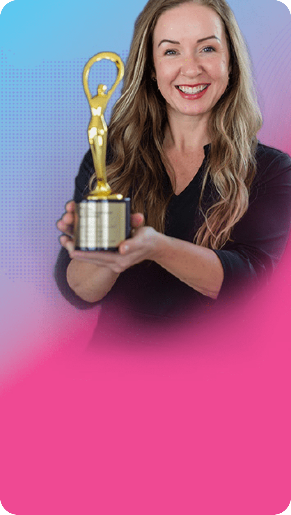 Woman smiling, holding a gold trophy with a figure on a stand, against a blue and pink backdrop.