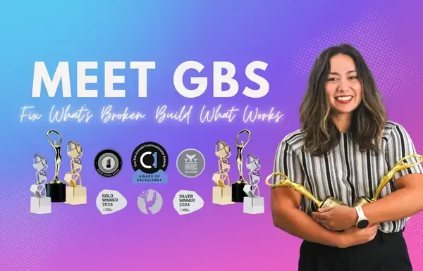 Woman holding trophies, smiling, with