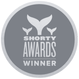Silver Shorty Awards Winner badge with whale tail logo.