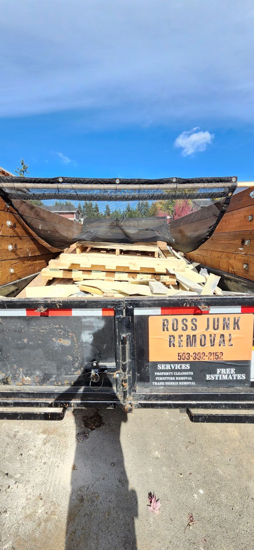 Dumpster filled with debris, 
