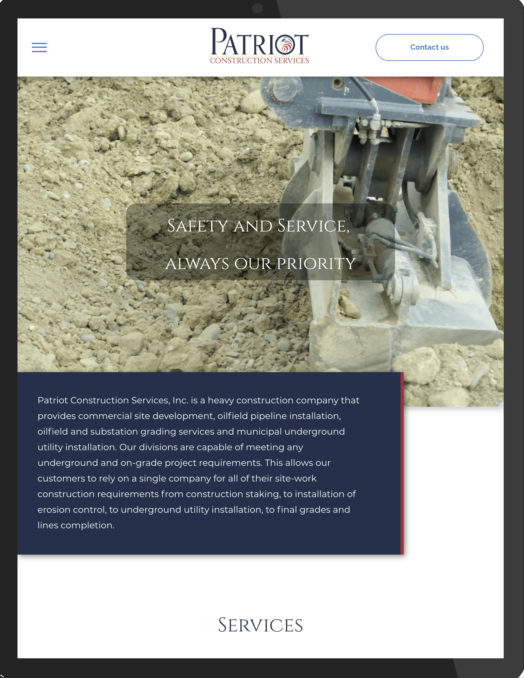 A patriot construction website shows a picture of a bulldozer in the dirt.
