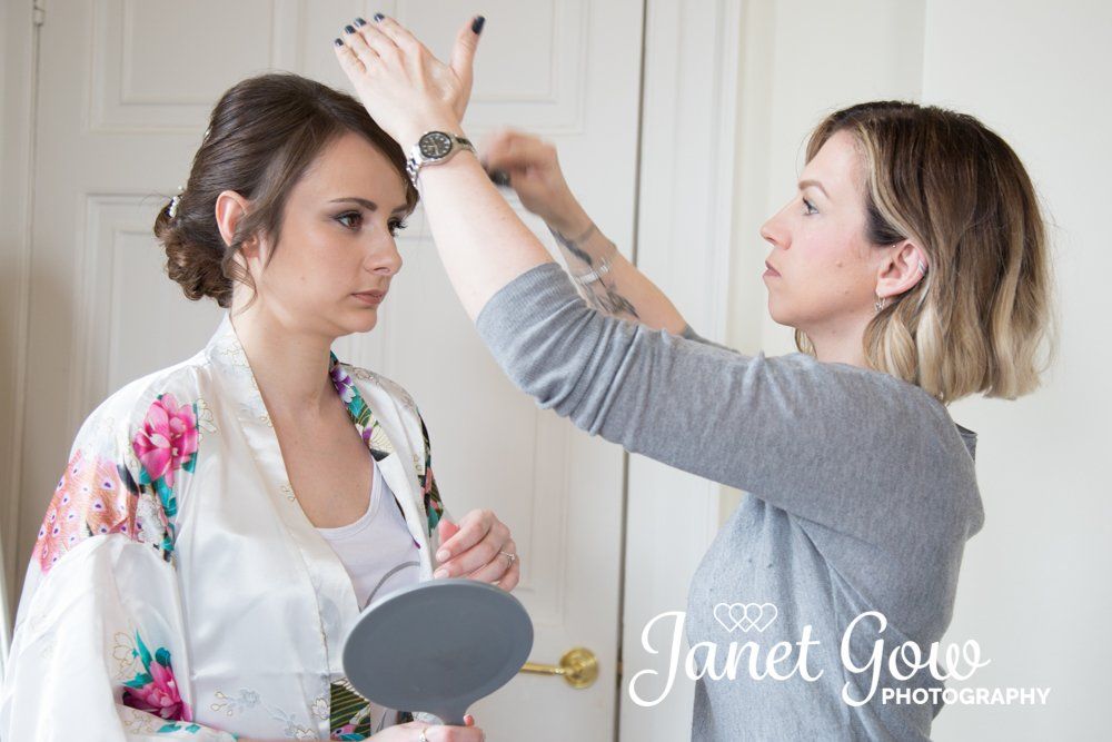 Jackie Jax Glam Beauty finishing touches to bridal hair and makeup