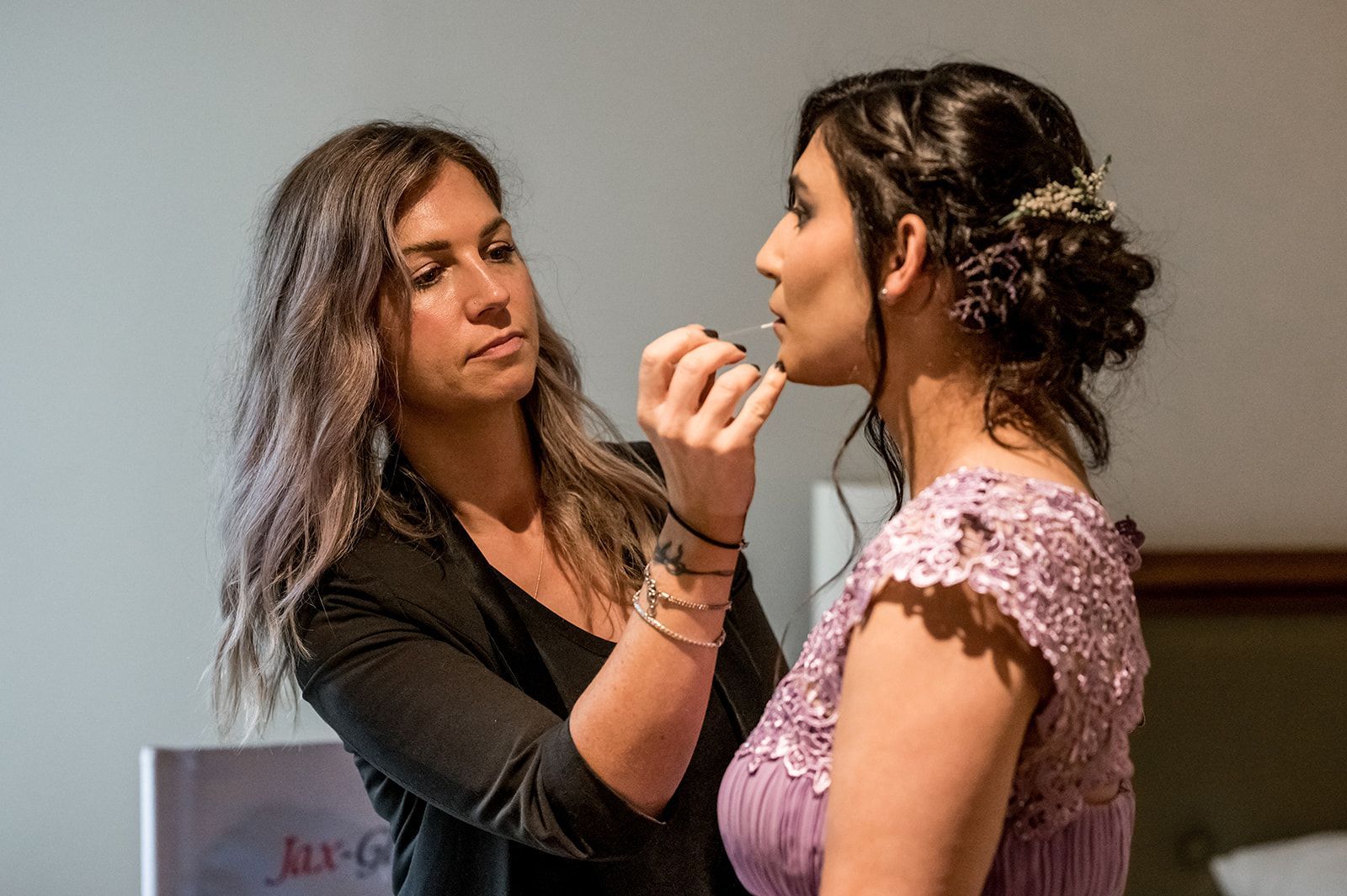 Jackie finishing touches on Bridesmaids Airbrush Makeup