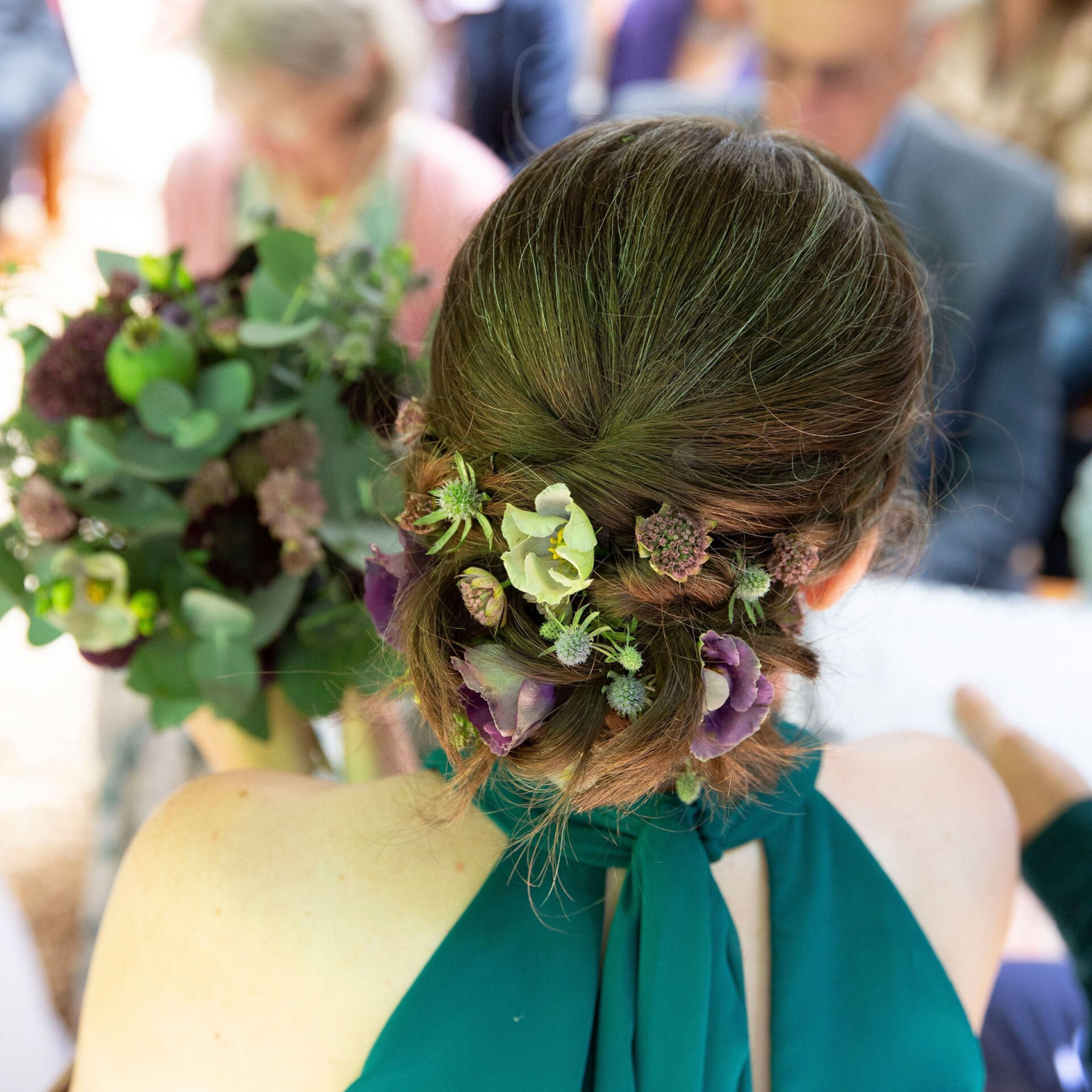 bridal hairstyle updo with flowers by Jax-Glam Beauty bridal hair Bristol
