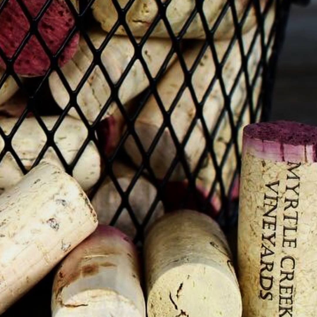 A basket of wine corks from myrtle creek vineyards