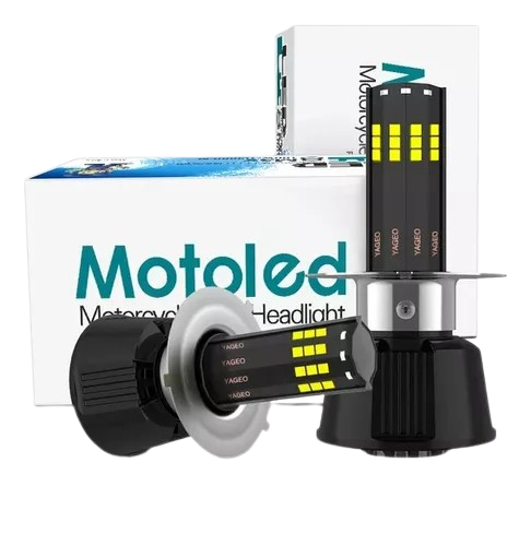 Un faro de motocicleta está colocado encima de una caja.