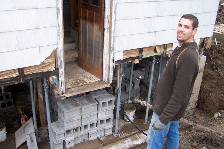 The Pro Seal Waterproofing team working on an exterior foundation repair job in the Niagara region.