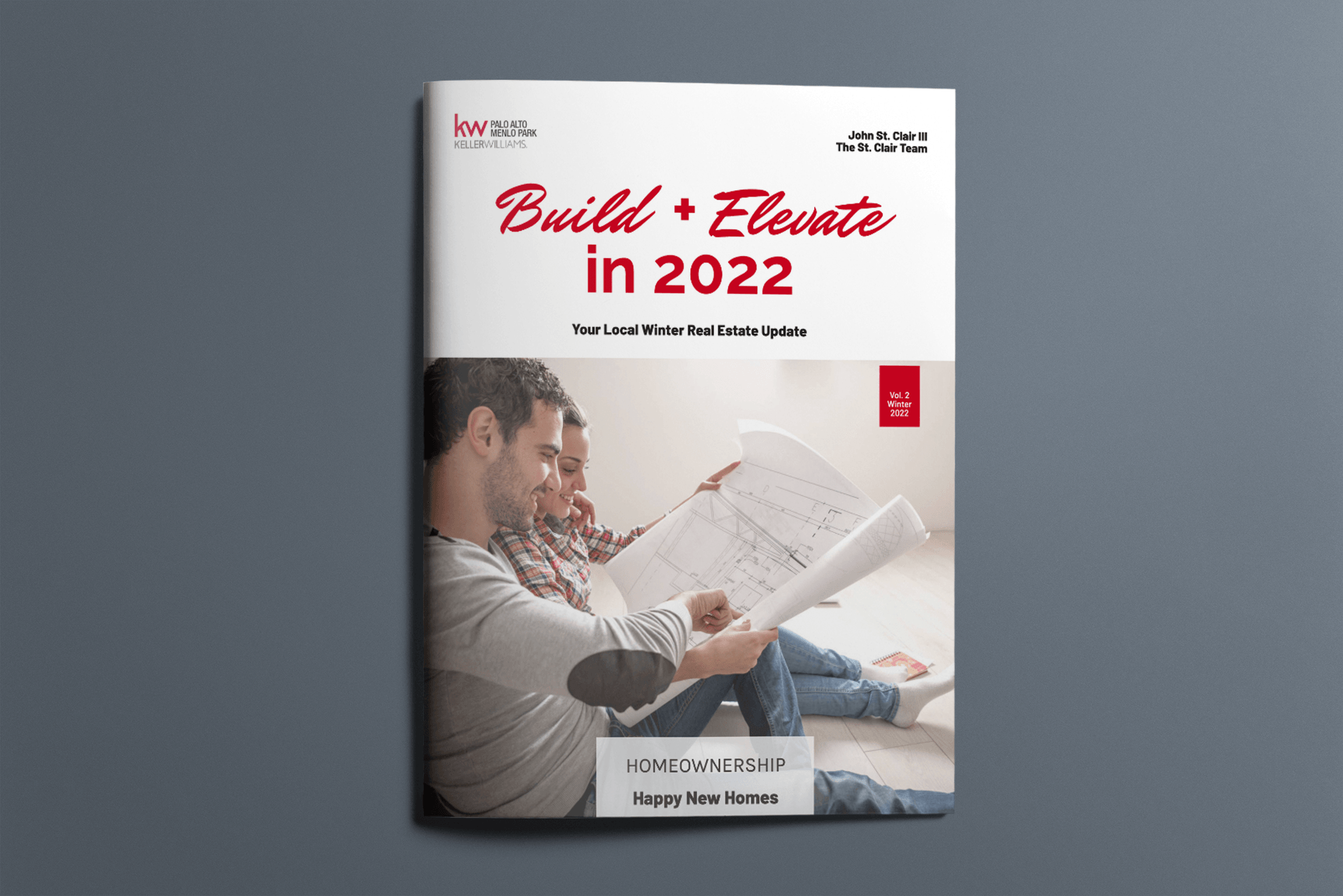 A couple of men are sitting on the floor reading a newspaper.