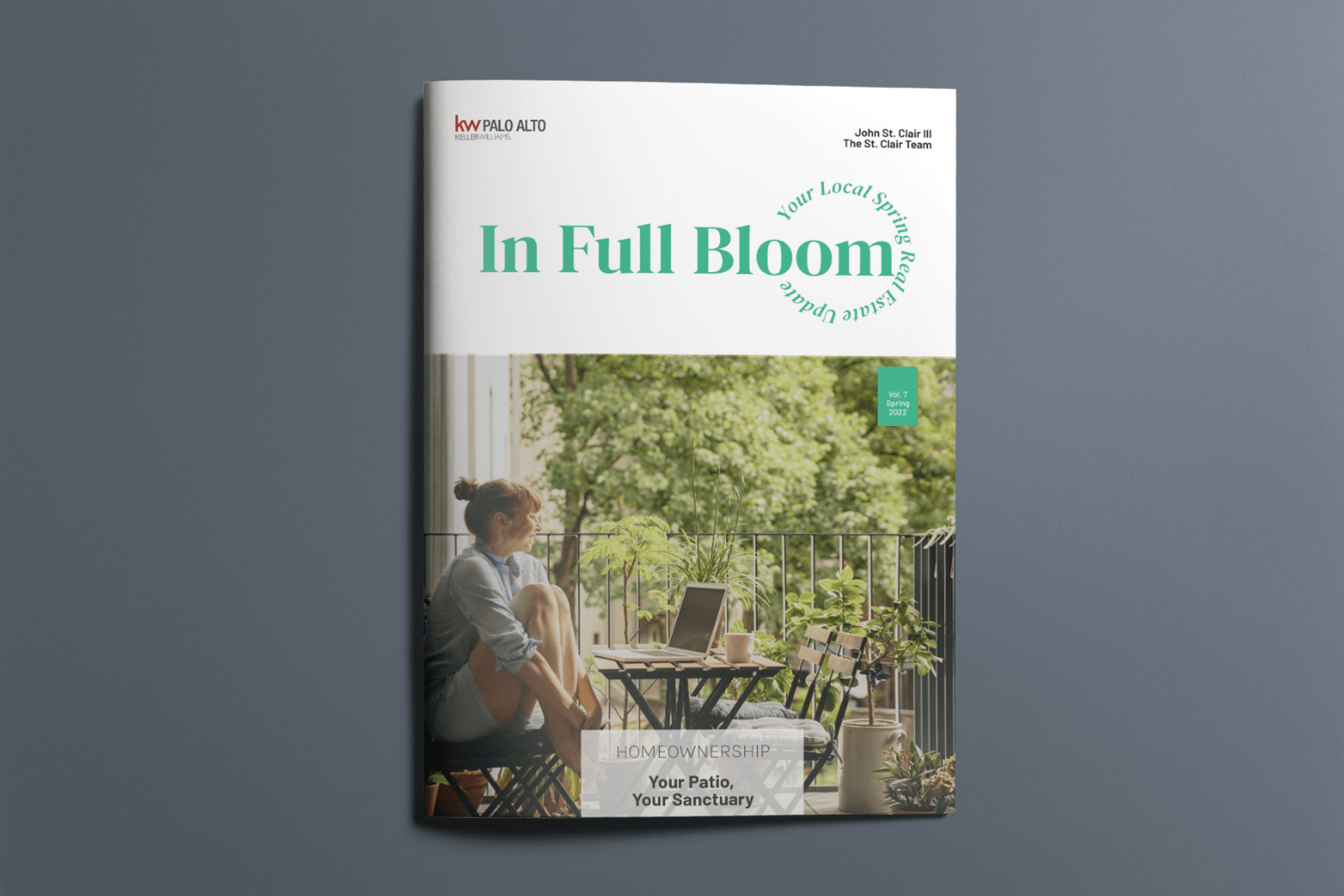 A magazine cover with a woman sitting at a table on a balcony.