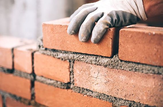 Installing Bricks — Providence, RI — S & A Construction Inc.