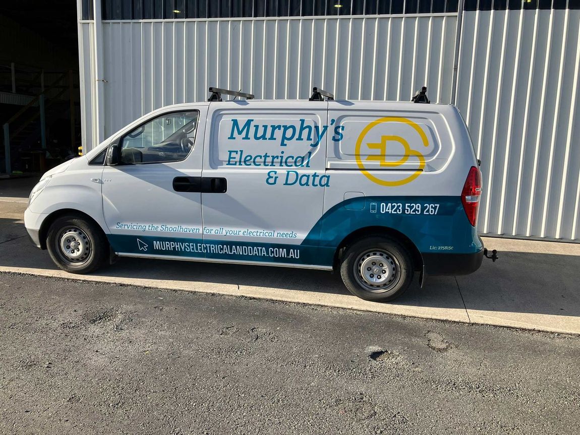 A White Service Car — Electricians in Shoalhaven, NSW