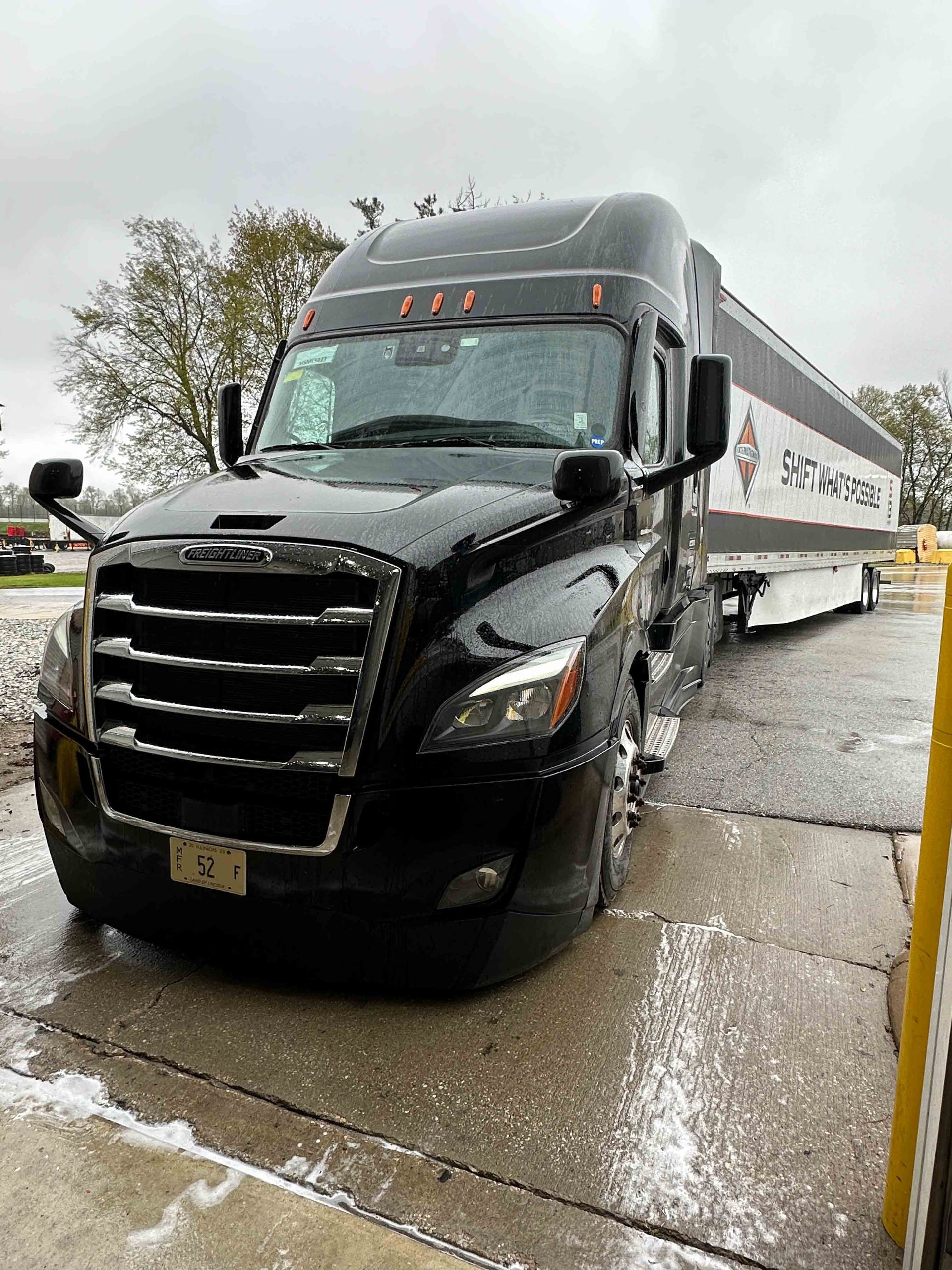 A close up of a car wheel with a mercedes logo on it