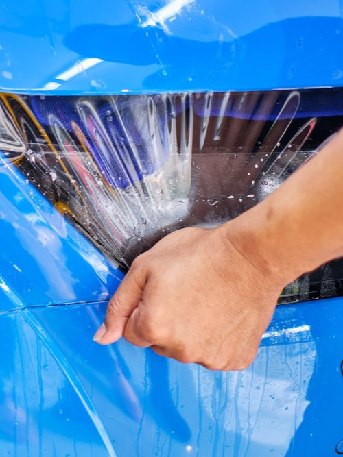 A close up of a car wheel with a mercedes logo on it
