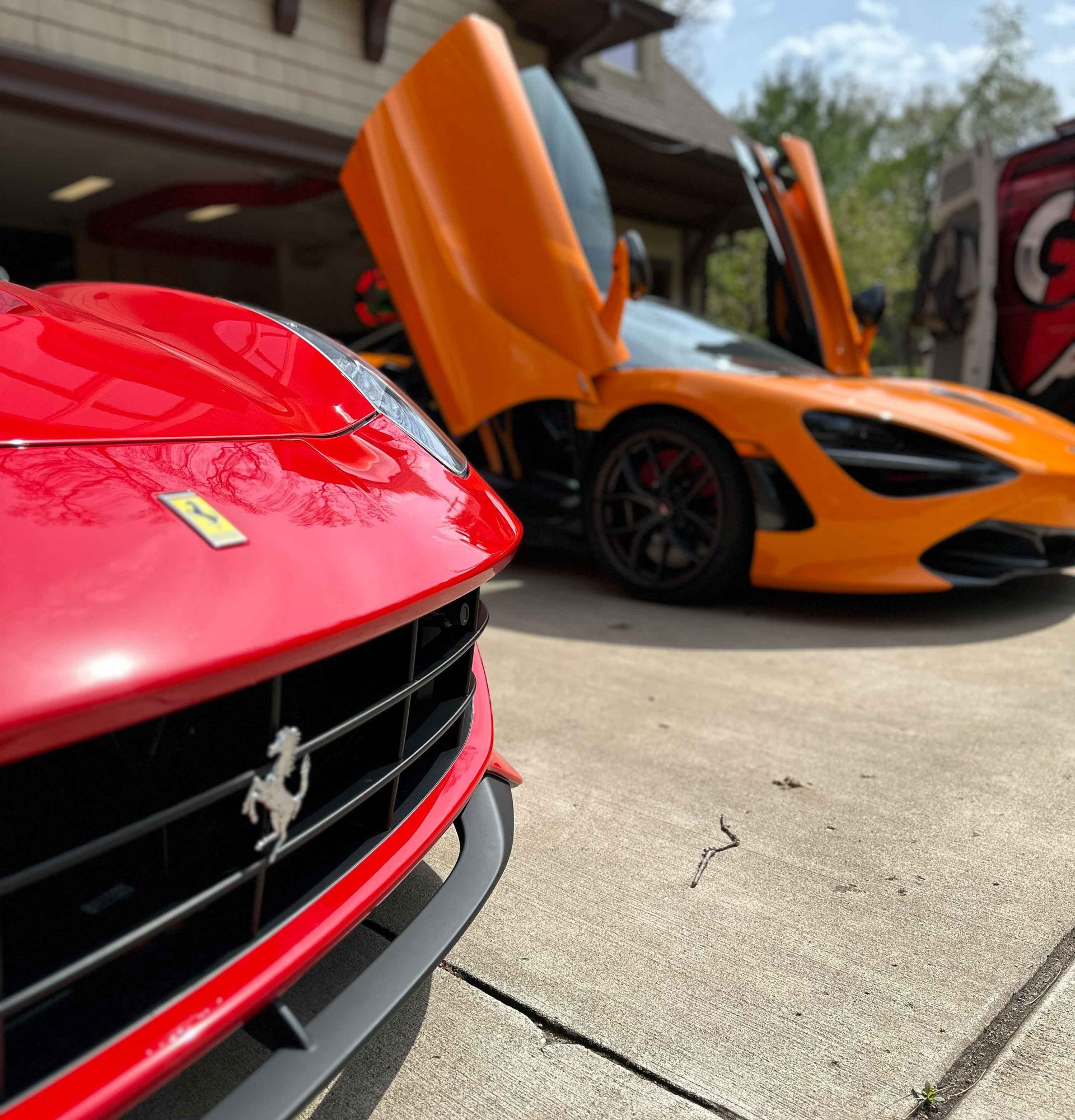 A close up of water drops on the hood of a car