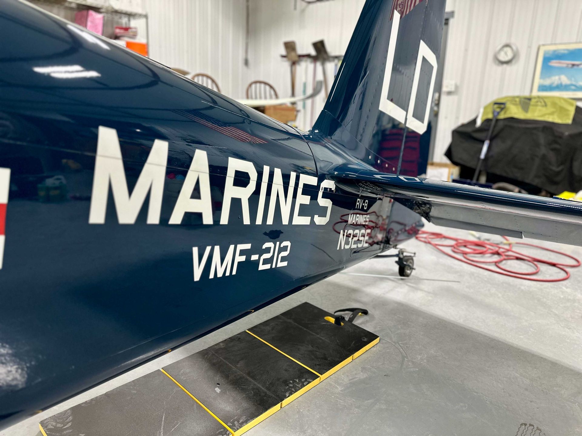 Dark blue aircraft tail labeled 