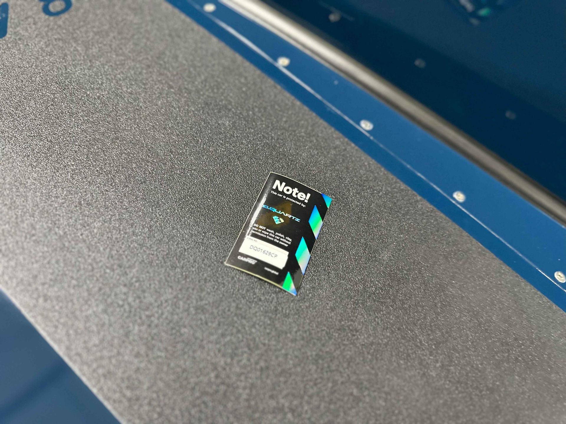 Small black, white, green, and silver 