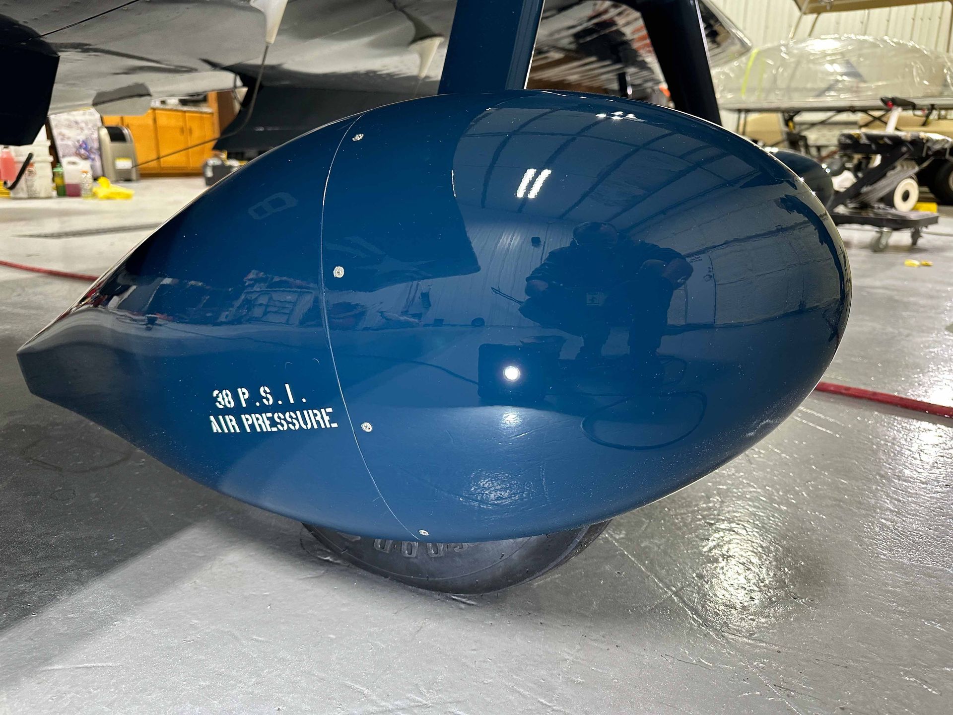 Dark blue aircraft part, with 