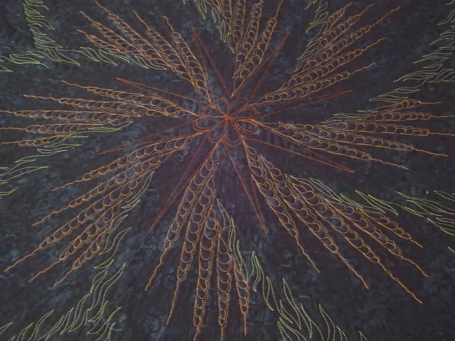 Quilt that looks like Orange and Yellow Fireworks Burst Against a Dark Night Sky — Morning Star Quilting in Bateau Bay, NSW