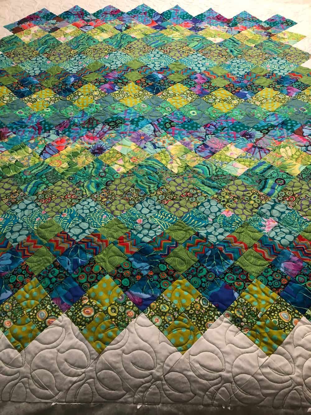 Quilted Fabric in Shades of Green and Blue Arranged in a Diamond Pattern — Morning Star Quilting in Bateau Bay, NSW