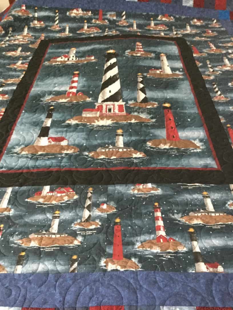 Lighthouse Quilt Featuring Various Lighthouses on a Blue and Black — Morning Star Quilting in Bateau Bay, NSW