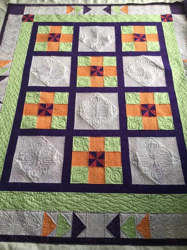 Quilt With Purple, Orange, and Green Squares — Morning Star Quilting in Bateau Bay, NSW