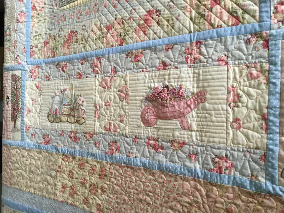 Close-up of a Floral Quilt With Light Blue and Pink Accents — Morning Star Quilting in Bateau Bay, NSW