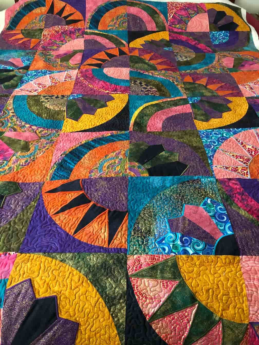 Colourful Abstract Quilt With Curved and Angular Shapes in Various Jewel Tones — Morning Star Quilting in Bateau Bay, NSW