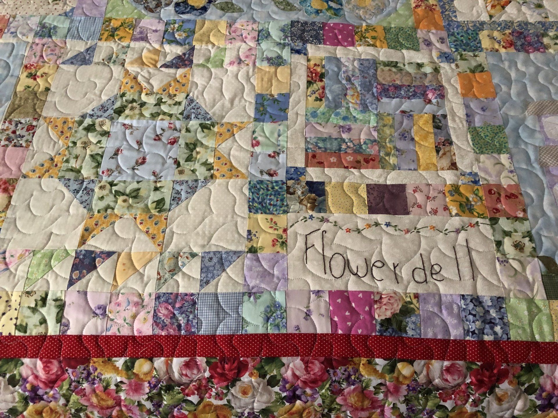 Close-up of a Colourful Quilt With Various Fabric Patches and the Embroidered — Morning Star Quilting in Bateau Bay, NSW