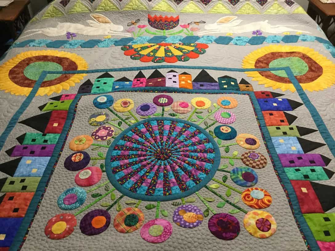 Quilt With Colourful Appliqué Design — Morning Star Quilting in Bateau Bay, NSW