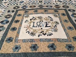 Quilted Blanket With Love in Floral Wreath, Surrounded by Patterned Borders — Morning Star Quilting in Bateau Bay, NSW