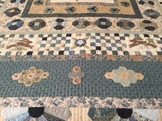 Quilted Textile With Floral and Geometric Patterns — Morning Star Quilting in Bateau Bay, NSW