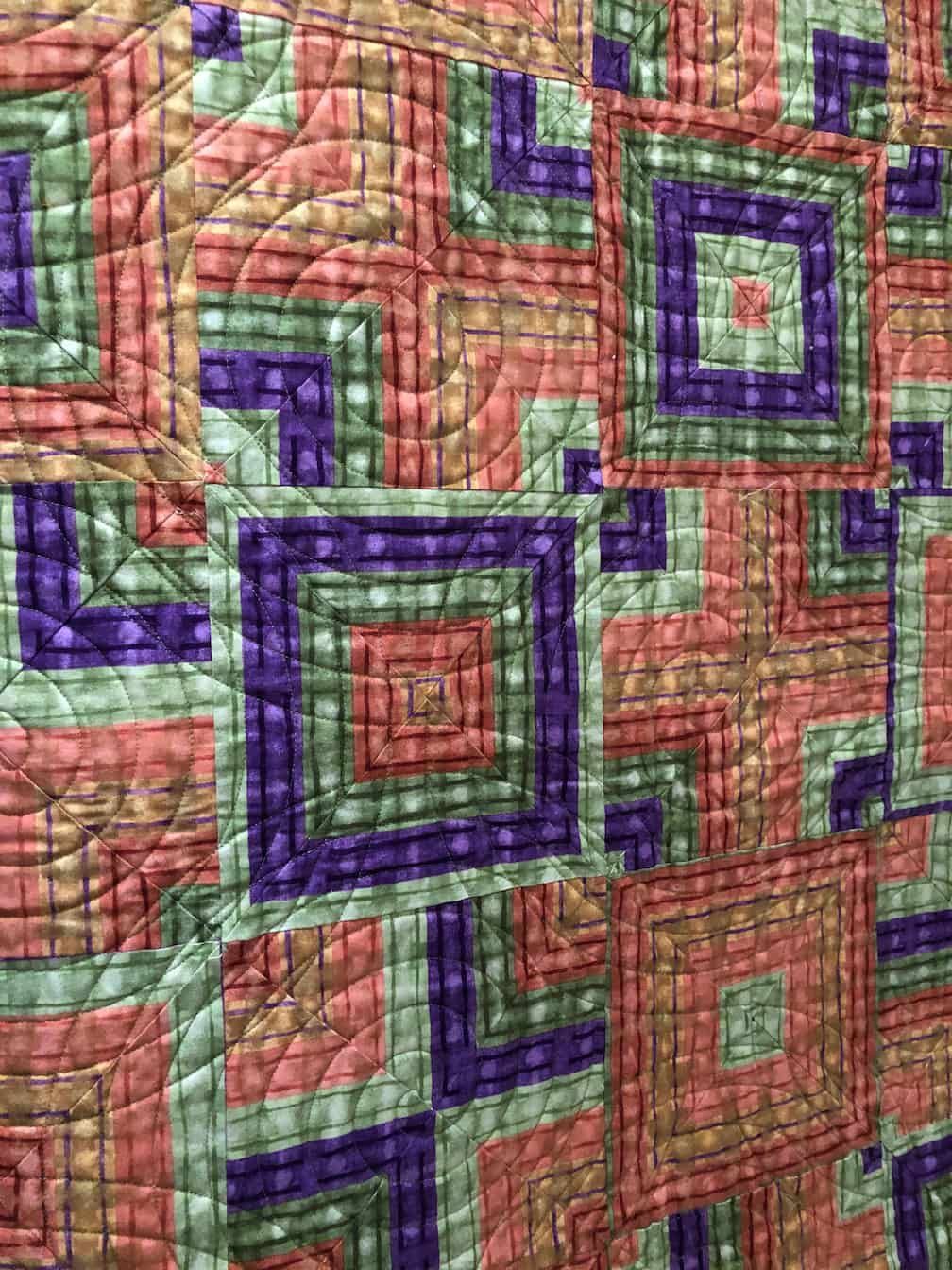 Quilt With Geometric Squares in Shades of Purple, Green, and Orange — Morning Star Quilting in Bateau Bay, NSW