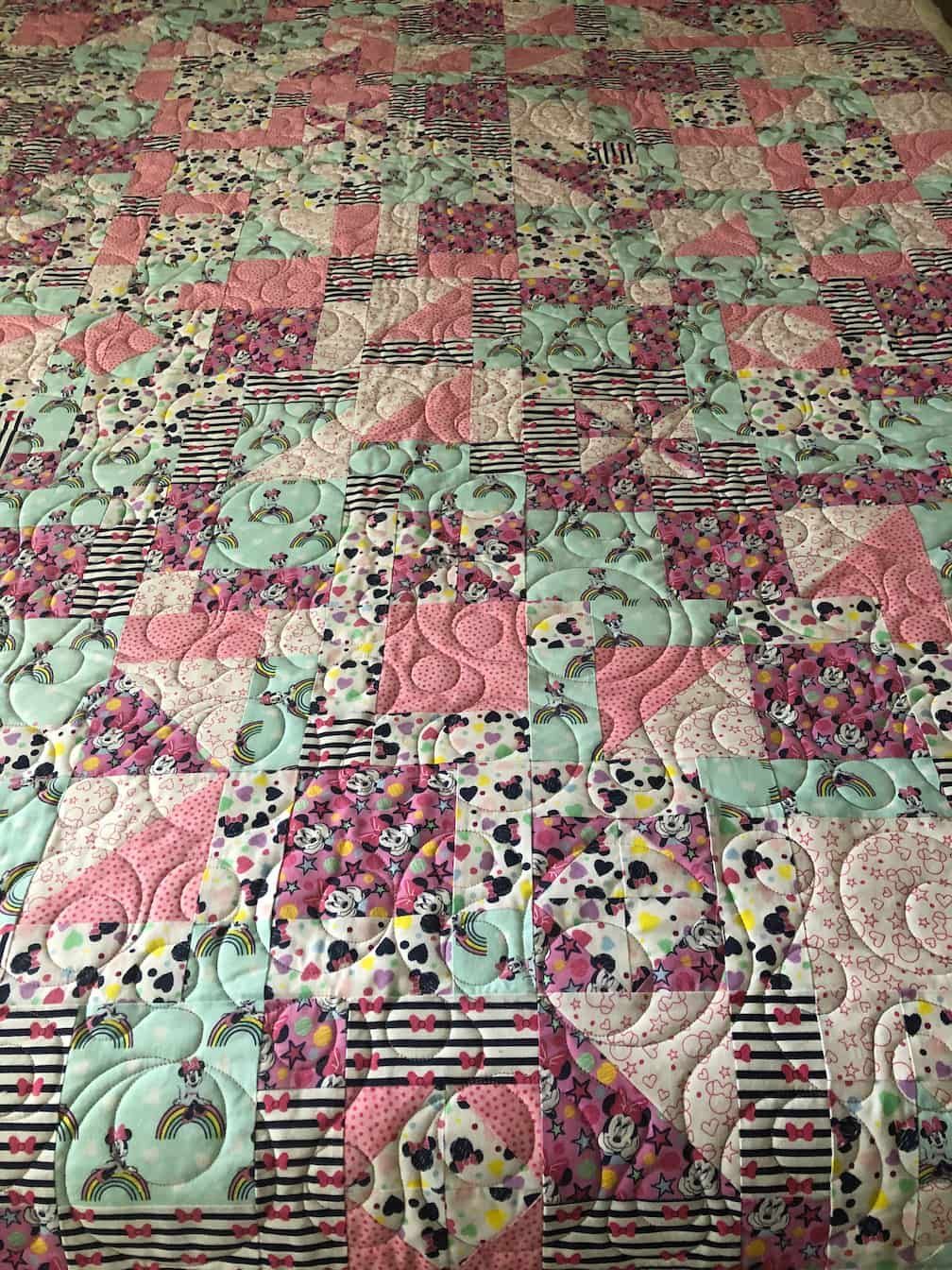 Quilt With Pink, Teal, and Patterned Squares and Decorative Stitching — Morning Star Quilting in Bateau Bay, NSW