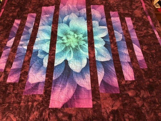 Quilt With a Large Floral Image in Blues and Purples — Morning Star Quilting in Bateau Bay, NSW