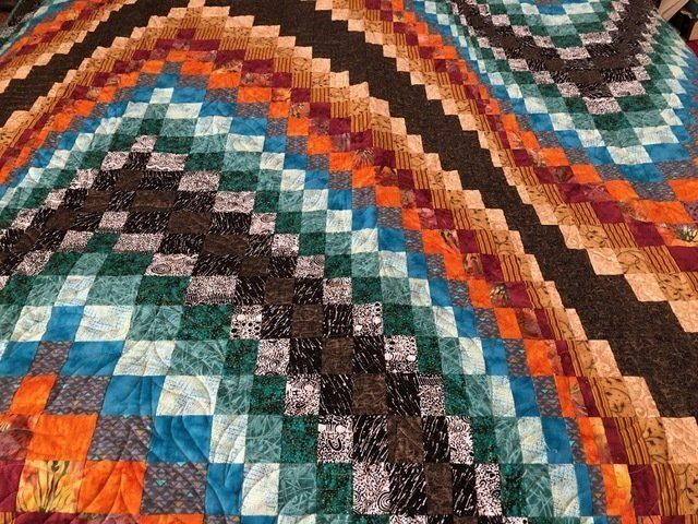 Colourful Quilt With Square Block Pattern in Diagonal Rows — Morning Star Quilting in Bateau Bay, NSW