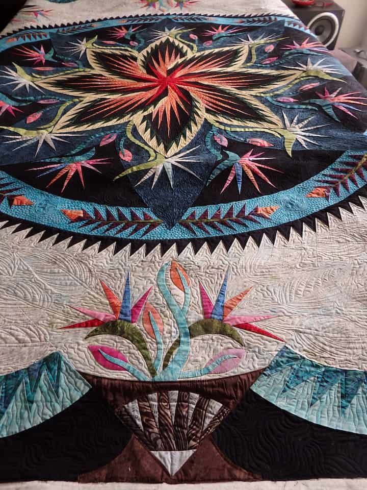 Detailed Floral Quilt With a Large Central Flower and a Vase of Birds-of-paradise — Morning Star Quilting in Bateau Bay, NSW
