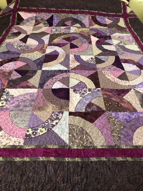 Quilt With Purple, Brown, and Pink Geometric Patterns — Morning Star Quilting in Bateau Bay, NSW