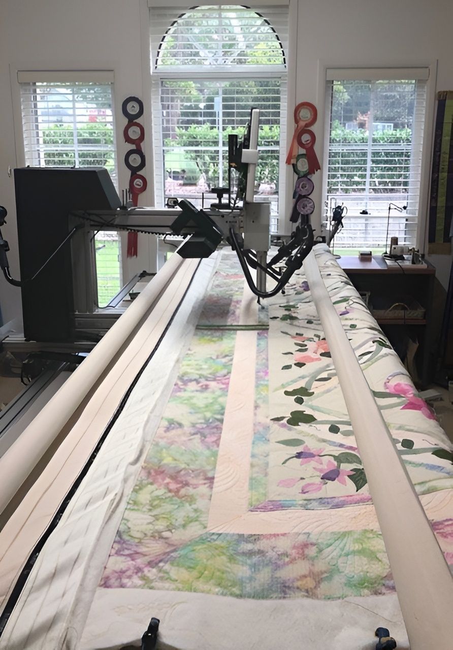 Colourful Quilt With Curved, Geometric Patterns — Morning Star Quilting in Bateau Bay, NSW