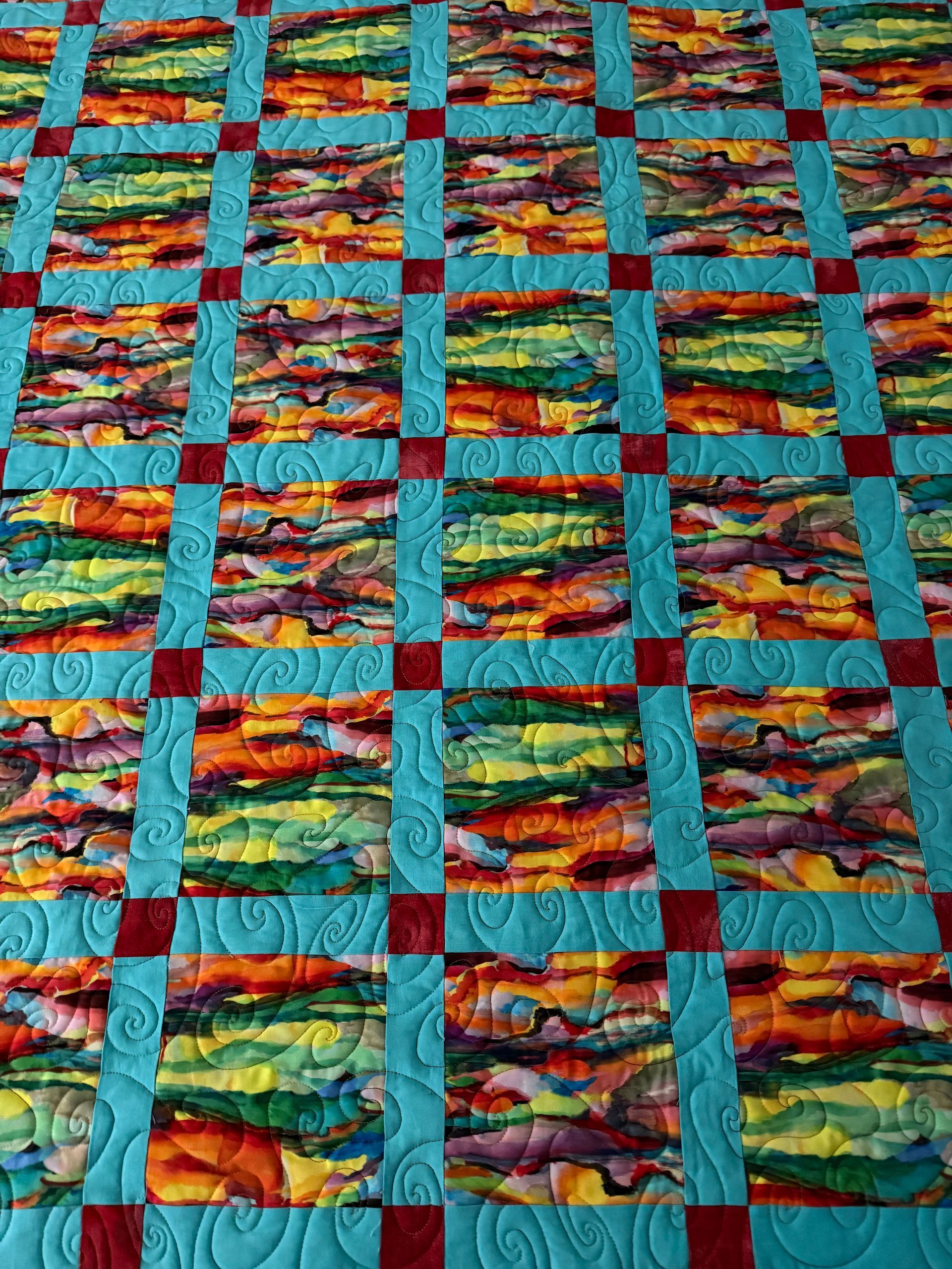 Person's Hands Working on a Patchwork Quilt on a Green Cutting Mat — Morning Star Quilting in Bateau Bay, NSW