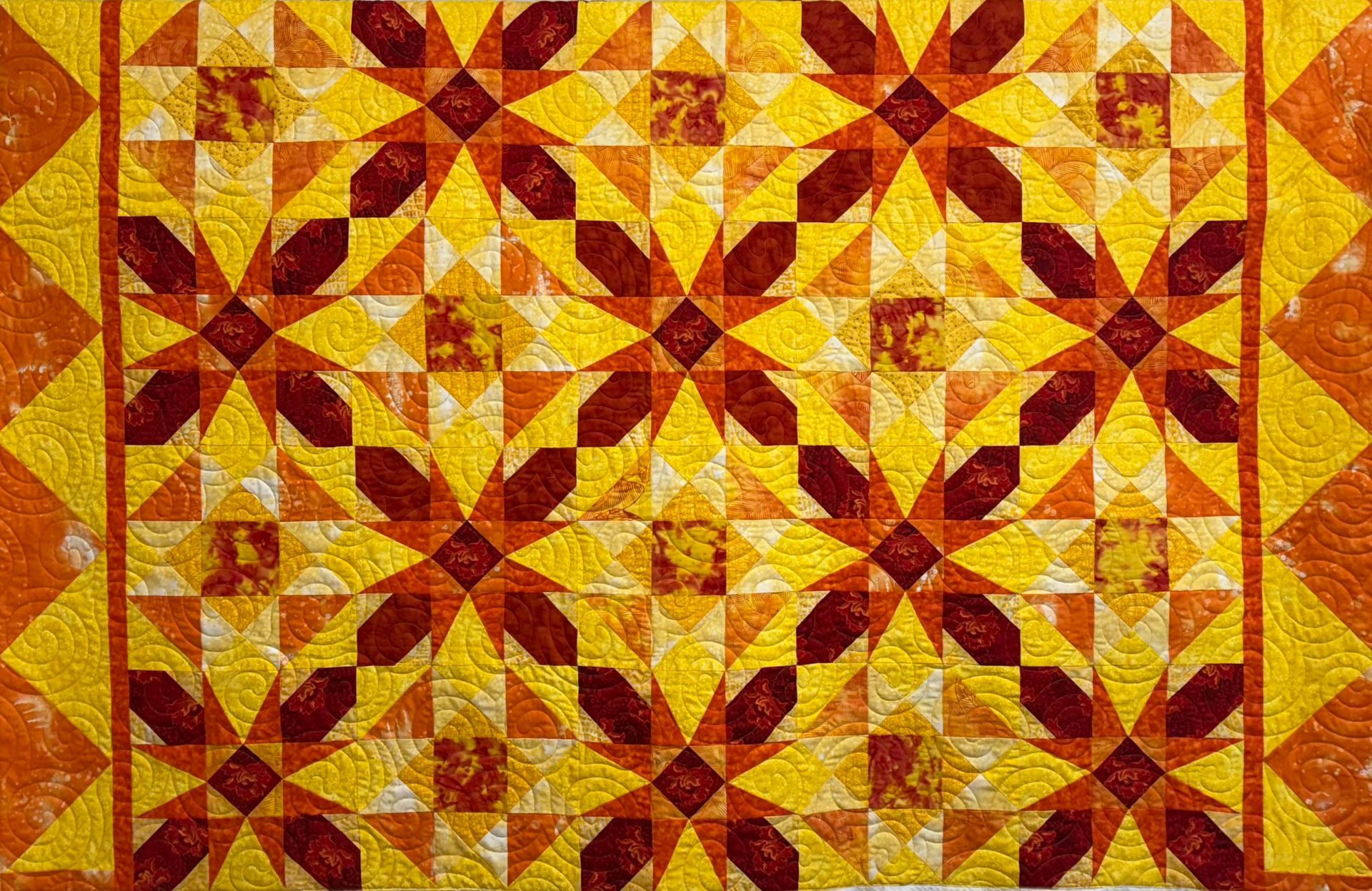 Yellow and orange starburst quilt pattern — Morning Star Quilting in Bateau Bay, NSW