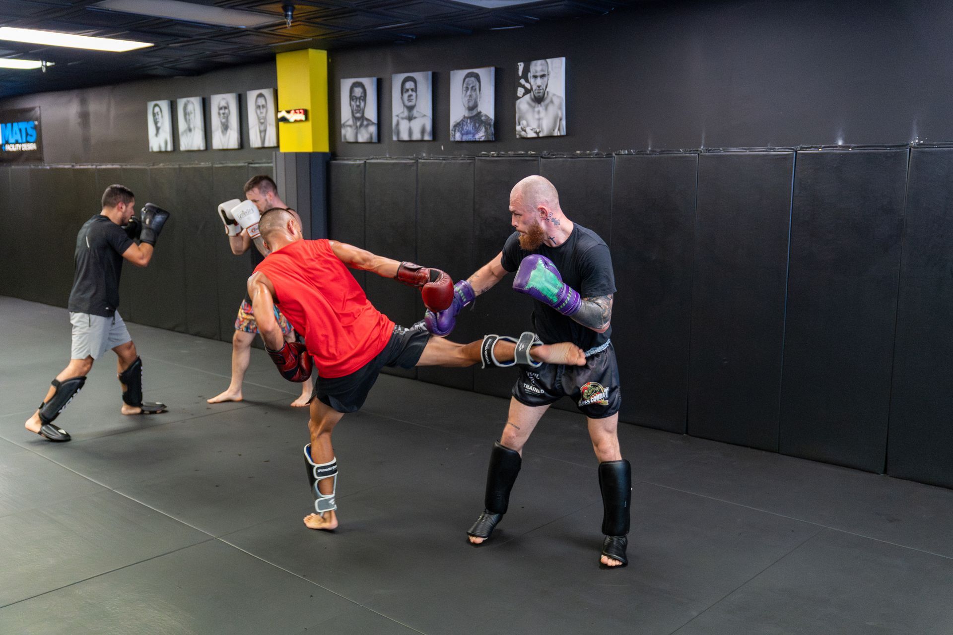 Adults practice No-Gi grappling at 10th Planet Orlando Jiu Jitsu in Altamonte Springs, FL.