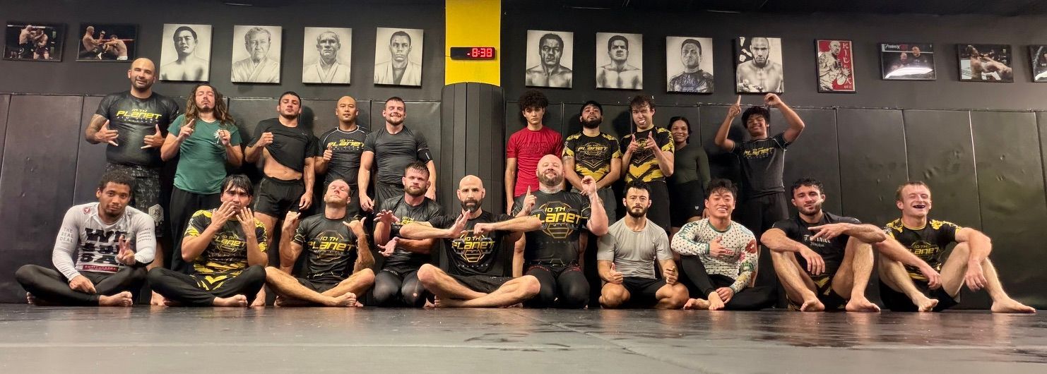 Adults drilling grappling fundamentals at 10th Planet Orlando Jiu Jitsu in Altamonte Springs, FL.