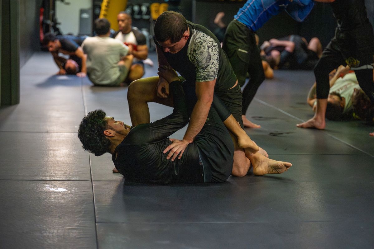 Adult students drilling no-gi grappling at 10th Planet Orlando Jiu Jitsu in Altamonte Springs, FL.