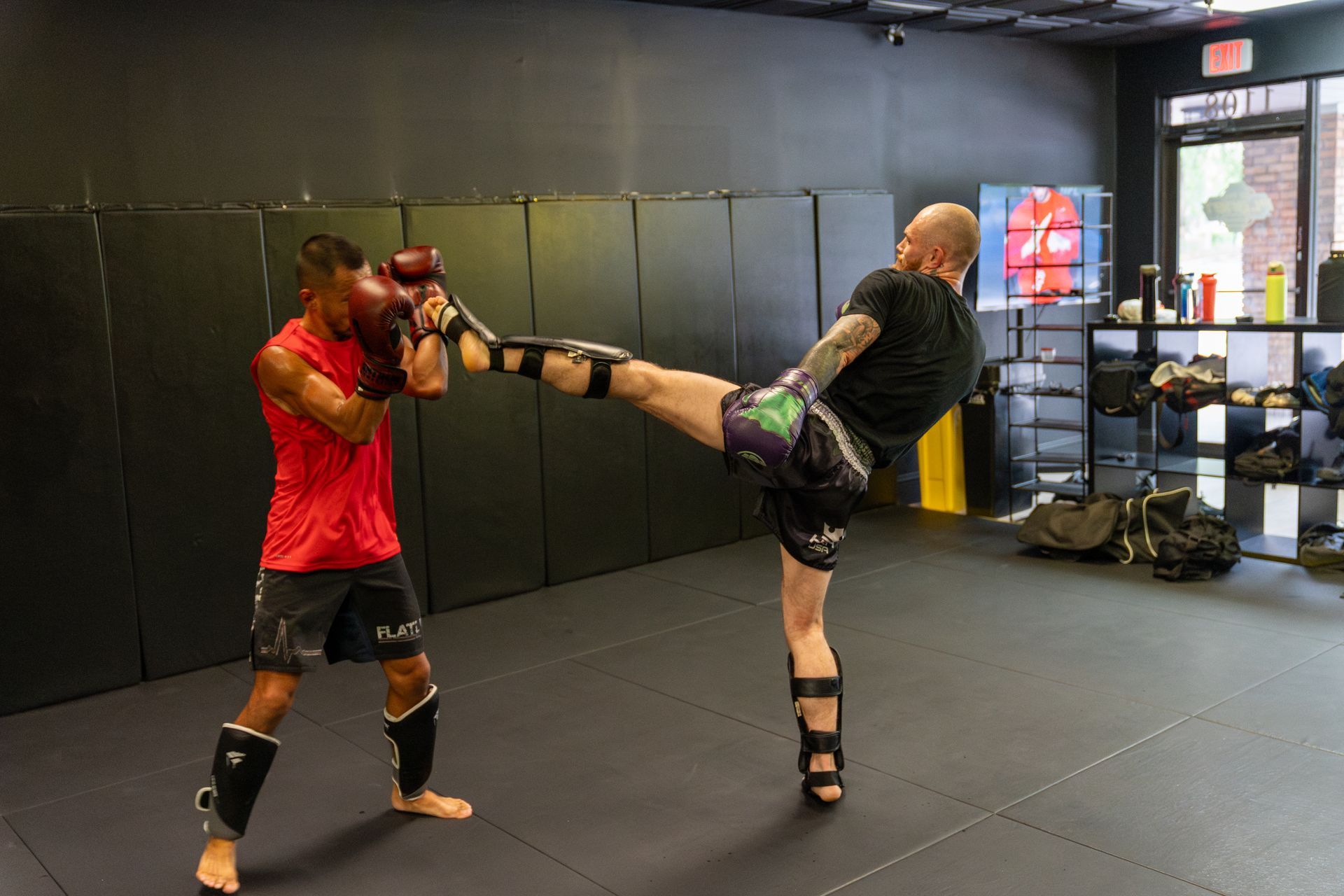 Adults practicing grappling drills at 10th Planet Orlando Jiu Jitsu in Altamonte Springs, FL.
